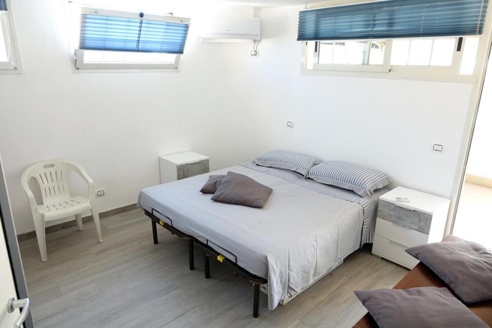 Ferienwohnung Terrazza Con Vista Nettuno Exterior foto