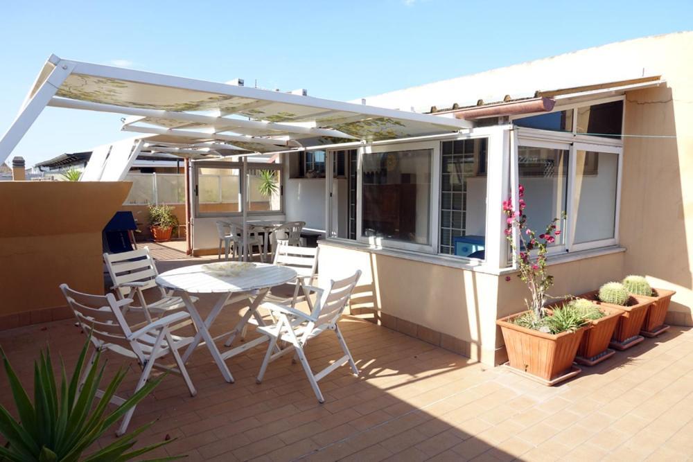 Ferienwohnung Terrazza Con Vista Nettuno Exterior foto
