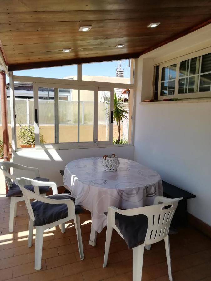 Ferienwohnung Terrazza Con Vista Nettuno Exterior foto